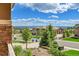 Scenic neighborhood view featuring well-maintained homes, lush landscaping, and peaceful surroundings at 5388 Water Oak Cir, Castle Rock, CO 80108