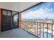 Balcony view featuring the city skyline beyond the black iron railing at 1551 Larimer St # 1803, Denver, CO 80202