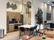 A modern kitchen with stainless steel appliances, sleek countertops, and stylish pendant lighting at 1551 Larimer St # 1803, Denver, CO 80202