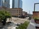 Street view captures the architectural details of historic buildings along a city street at 1551 Larimer St # 1803, Denver, CO 80202