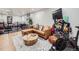 Finished basement featuring a cozy sectional, exercise equipment, and a modern interior at 1140 S Elm St, Denver, CO 80246