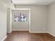 Inviting bedroom with hardwood floors and a window; provides a comfortable and private retreat space at 6380 S Boston St # 391, Greenwood Village, CO 80111