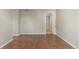 Spacious bedroom featuring hardwood floors and ample closet space at 6380 S Boston St # 391, Greenwood Village, CO 80111