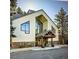 Stunning building exterior with unique architectural details and expansive windows creating a grand entrance at 6380 S Boston St # 391, Greenwood Village, CO 80111