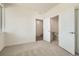 Bright bedroom showcasing an open doorway with bath access and closet at 647 Skyhook St, Erie, CO 80516
