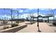 Plaza view with benches and brick sidewalk at 12175 W 68Th Pl, Arvada, CO 80004