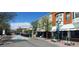 Street view with shops and restaurants at 12175 W 68Th Pl, Arvada, CO 80004