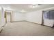 Spacious finished basement offering ample lighting and a comfortable carpet at 17943 E Bates Ave, Aurora, CO 80013