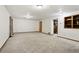 Large finished basement providing an open layout with good lighting and carpet flooring at 17943 E Bates Ave, Aurora, CO 80013