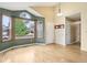 Bright living room with beautiful hardwood floors, a large window, and vaulted ceilings at 17943 E Bates Ave, Aurora, CO 80013