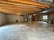 Spacious unfinished basement ready for customization, with exposed ceiling and concrete floors at 1688 Aquamarine Dr, Brighton, CO 80603
