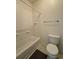 Clean and functional bathroom with a tiled shower-tub combination and standard toilet at 1688 Aquamarine Dr, Brighton, CO 80603