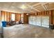 Spacious two-car garage featuring high ceilings and ample storage space for vehicles and tools at 1688 Aquamarine Dr, Brighton, CO 80603