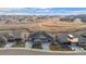Aerial view of house and surrounding neighborhood at 12664 Ulster St, Thornton, CO 80602