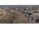 Aerial view of neighborhood with creek at 12664 Ulster St, Thornton, CO 80602