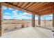 Covered patio with a view of open space at 12664 Ulster St, Thornton, CO 80602