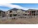 Rear view of two story home with deck at 12664 Ulster St, Thornton, CO 80602