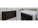 Convenient laundry room with washer and dryer at 12664 Ulster St, Thornton, CO 80602