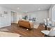 Open living space featuring hard surface floors, fresh paint, and plenty of natural light at 1275 Winona Ct # B, Denver, CO 80204