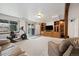 Spacious basement area featuring comfortable seating and an exercise bike for a functional living space at 11131 Seton Pl, Westminster, CO 80031