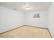 Unfurnished basement bedroom with neutral carpeting, one small window, and simple fixtures, ready for customization at 11131 Seton Pl, Westminster, CO 80031
