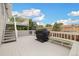 Two-tiered deck featuring a grill and bench, perfect for outdoor entertaining and relaxing with a view at 11131 Seton Pl, Westminster, CO 80031