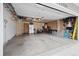 Spacious two-car garage providing ample storage space and parking with lots of items at 11131 Seton Pl, Westminster, CO 80031