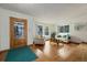 Cozy living room featuring hardwood floors, bright windows, and comfortable seating at 11131 Seton Pl, Westminster, CO 80031