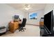 Bright office featuring a large desk with an ergonomic chair and a window overlooking the neighborhood at 11131 Seton Pl, Westminster, CO 80031