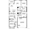 First floor plan featuring the garage, porch, foyer, kitchen, and four bedrooms at 18785 E 99Th Ave, Commerce City, CO 80022