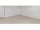 This bright bedroom features neutral carpet and clean white walls at 9886 Ceylon Ct, Commerce City, CO 80022