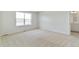 Sun-filled bedroom showcasing neutral carpet at 9886 Ceylon Ct, Commerce City, CO 80022