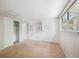Bedroom with carpet, window, closet and neutral paint at 7190 S Poplar Ct, Centennial, CO 80112