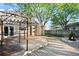 This backyard features a wooden deck with a gazebo, fire pit, and plenty of space for outdoor entertaining at 12665 Grove Ct, Broomfield, CO 80020