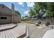 Backyard features a deck, firepit and an artificial turf lawn at 12665 Grove Ct, Broomfield, CO 80020