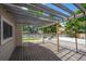 Wooden pergola and deck in backyard with an artifical turf lawn at 12665 Grove Ct, Broomfield, CO 80020