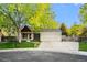 Charming one-story home featuring an attached garage and inviting walkway at 12665 Grove Ct, Broomfield, CO 80020