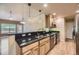 Kitchen with stainless steel appliances and granite countertops at 6727 W Yale Ave, Lakewood, CO 80227