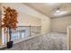 Spacious loft area with carpet flooring and a ceiling fan at 6727 W Yale Ave, Lakewood, CO 80227