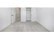 Bright bedroom features neutral walls, gray carpet, and a sliding door closet at 5688 N Killarney Ct, Aurora, CO 80019