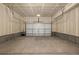Spacious garage with sealed concrete floors and high ceilings at 5688 N Killarney Ct, Aurora, CO 80019