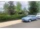 Well-maintained home with mature trees and lush landscaping at 14751 E 24Th Ave, Aurora, CO 80011
