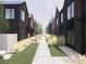 Charming street view showcasing modern homes with unique architectural designs and welcoming landscaped pathways at 769 Turner St, Erie, CO 80516