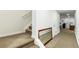 Hallway with carpeted stairs and mirror at 17470 E 95Th Pl, Commerce City, CO 80022
