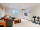 Finished basement area with recessed lighting and comfortable seating at 5292 Lichen Pl, Boulder, CO 80301