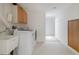 Spacious laundry room with a sink and modern appliances at 5292 Lichen Pl, Boulder, CO 80301