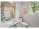 Bathroom featuring granite countertop, tile flooring and shower at 6105 W Long Dr, Littleton, CO 80123