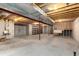 This unfinished basement features exposed ceiling joists and ductwork at 1120 Antelope W Dr, Bennett, CO 80102
