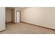 This basement offers neutral walls and carpet at 1120 Antelope W Dr, Bennett, CO 80102