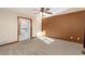 Bright bedroom offers a tranquil space with views of an ensuite bathroom featuring a luxurious soaking tub at 1120 Antelope W Dr, Bennett, CO 80102